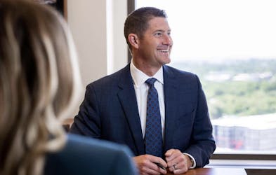 Ryan Warwick meeting with clients.