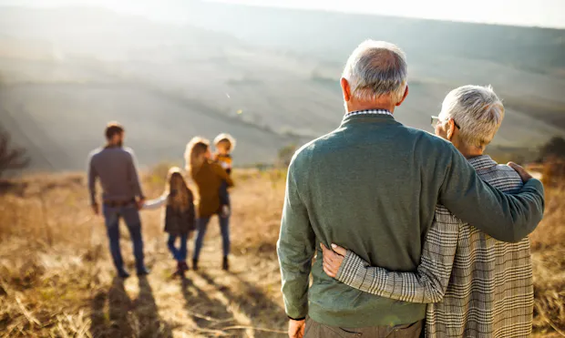 Couple looking at their family.