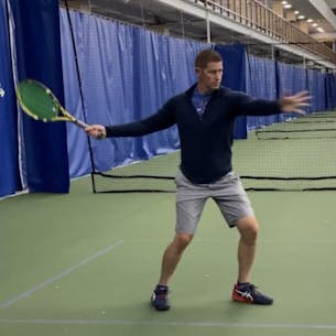 Ryan playing tennis