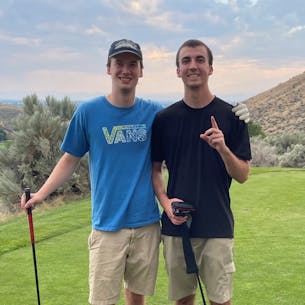 Tim and friend golfing