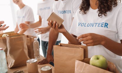 Volunteers packing lunches